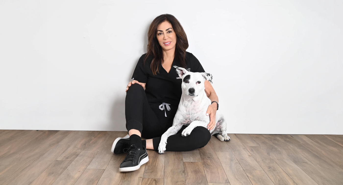 picture of Houston Texas dentist Terri Alani D D S and her dog