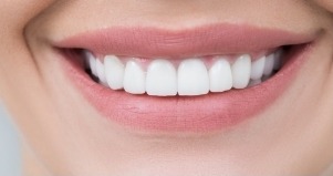 Close up of smile with white teeth