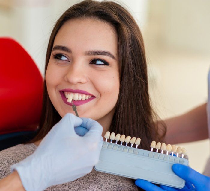 Young woman getting Lumineers in Houston from cosmetic dentist