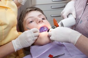 A child at their dental appointment.